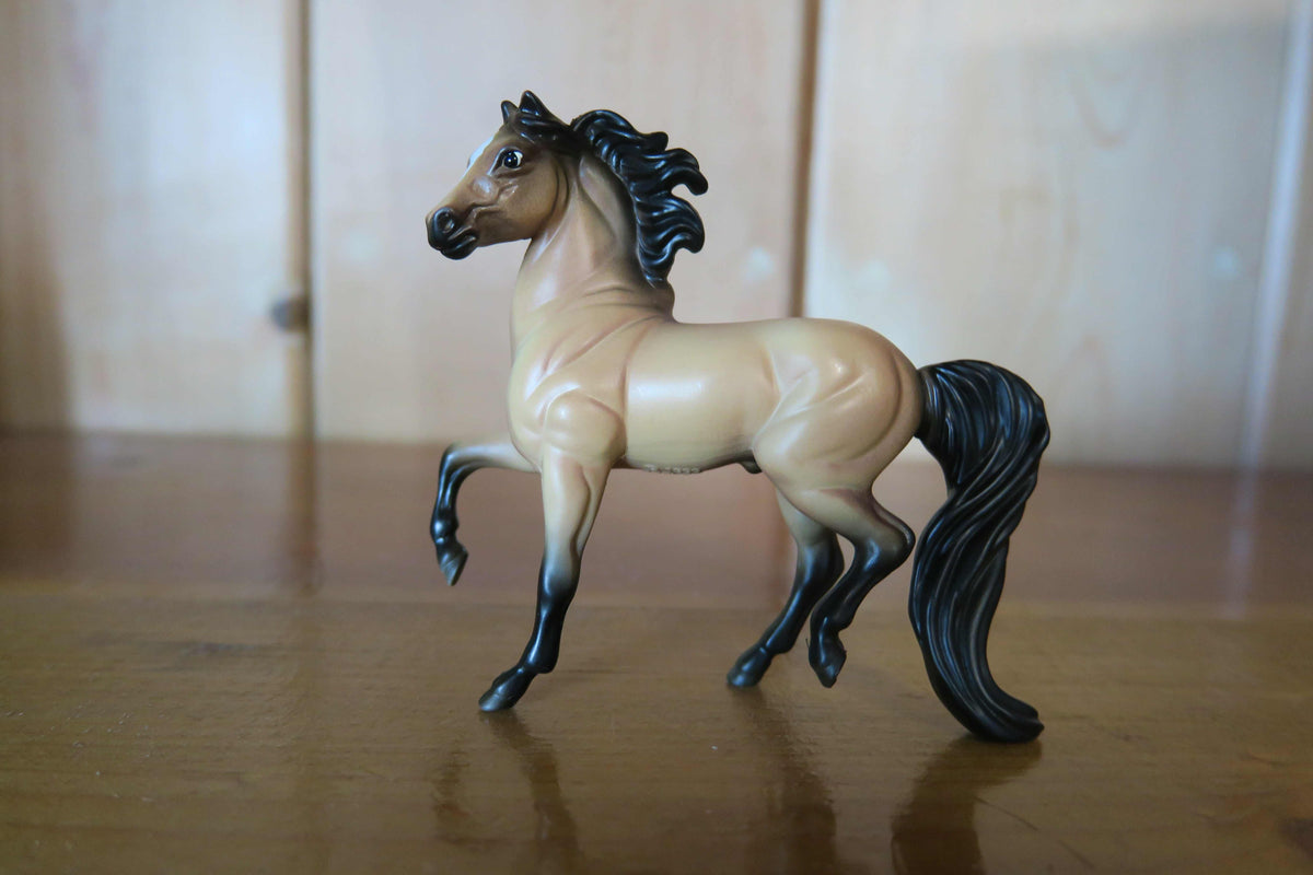 Prancing Honey Bay horse figure displayed as a traditional animal toy